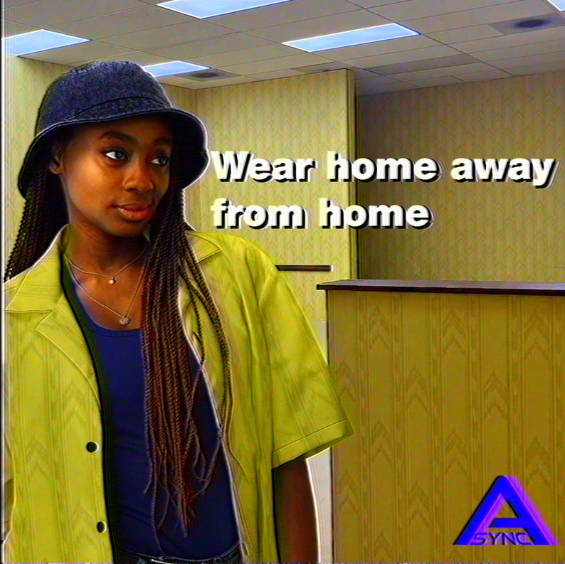 Model in a bucket hat wearing the yellow Backrooms wallpaper button-up shirt open over a tank top, wear home away from home