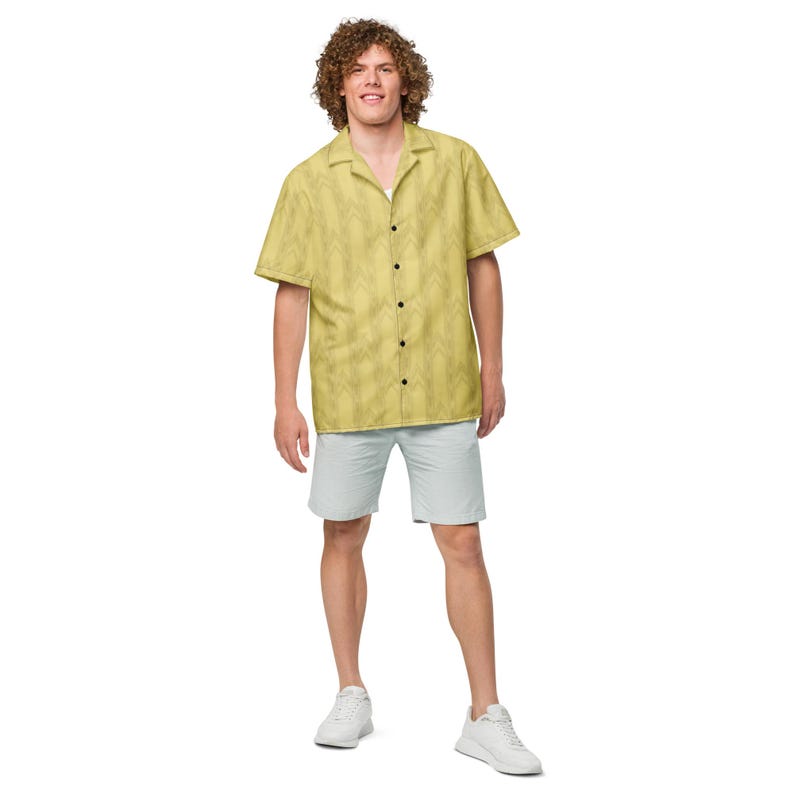 Full-body view of a model wearing the yellow Backrooms Level 0 wallpaper shirt with shorts