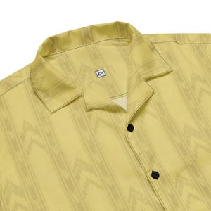 Close-up of the collar, buttons and yellow chevron wallpaper fabric on the Backrooms button-up
