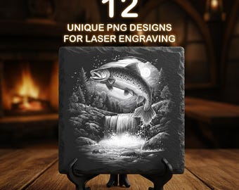 May include: A black slate plaque with a grayscale illustration of a fish leaping over a waterfall under a full moon. The text "12 UNIQUE PNG DESIGNS FOR LASER ENGRAVING" is at the top. The plaque is displayed on a black stand, set against a blurred background.