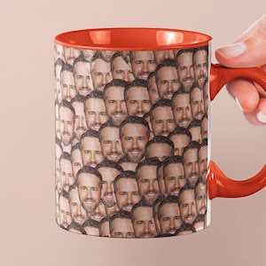 Può includere: Una tazza da caffè rossa con un motivo di un viso maschile ripetuto su tutta la tazza.