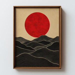 May include: A framed wall art print featuring a large, textured red circle positioned above a series of layered, black rolling hills. The hills are defined by fine, thin, light-colored contour lines that create a sense of depth and movement.