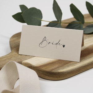 Configurações de lugar | Cartões de nomes dobrados | Coração | Plano de assentos | Casamento | Evento corporativo | Ocasião especial | Texto preto ou branco