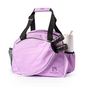 Stylish womens pickleball bag trendy paddle tote sleek design elegant gear bag compact lightweight adjustable strap travel ready durable yet fashionable chic pickleball storage feminine style vibrant colors tournament ready high quality versatile bag