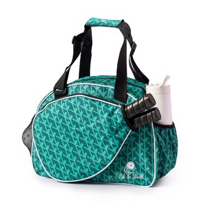 Stylish womens pickleball bag trendy paddle tote sleek design elegant gear bag compact lightweight adjustable strap travel ready durable yet fashionable chic pickleball storage feminine style vibrant colors tournament ready high quality versatile bag