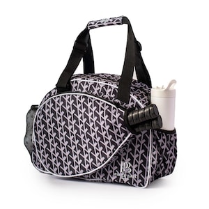 Stylish womens pickleball bag trendy paddle tote sleek design elegant gear bag compact lightweight adjustable strap travel ready durable yet fashionable chic pickleball storage feminine style vibrant colors tournament ready high quality versatile bag