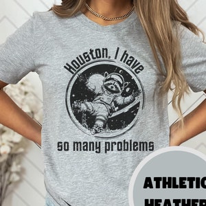 Houston I Have So Many Problems Shirt Funny Raccoon In Space Funny Retro Galaxy Tee Graphic Shirt Bella + Canvas 3001