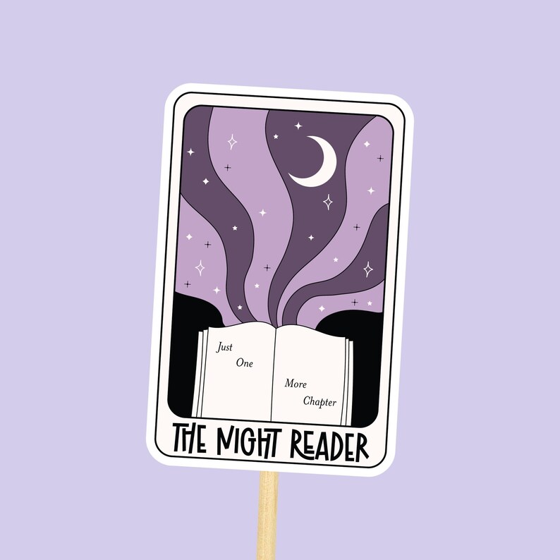 a purple bookish sticker with a tarot card aesthetic. It says "The Night Reader"