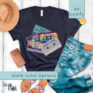 Customizable Concert short sleeve crewneck Tshirt t-shirt tee shirt. Vintage Cassette Tape Tee Shirt For Concerts, Music Fan Gift, Country Music Gifts, Personalized 80's Inspired Tshirt. Customize with artist name, three favorite songs, date and city