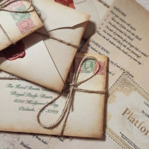 May include: A stack of vintage envelopes tied with twine and sealed with wax. The envelopes are addressed to a fictional character and include a Hogwarts acceptance letter with the text "Platform 9 3/4".
