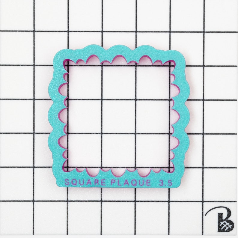 May include: A turquoise blue square plaque cookie cutter with a scalloped edge. The cutter is 3.5 inches in size and has the text "SQUARE PLAQUE 3.5" printed on the bottom.