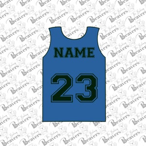 May include: A blue basketball jersey with the number 23 and the word "NAME" printed on the back.