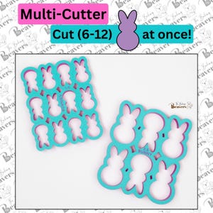 May include: Two turquoise blue cookie cutters shaped like bunnies. The larger cutter has 12 bunny shapes and the smaller cutter has 4 bunny shapes. The cutters are on a white background. The text "BUNNIES" is printed on the larger cutter and "BUNNY" is printed on the smaller cutter.