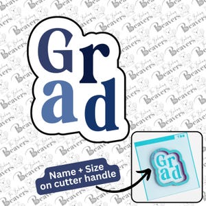 May include: A graduation-themed cookie cutter with the word "Grad" in shades of blue. The cutter has a white outline and a small image of the cutter with the text "Name + Size on cutter handle".