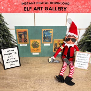 May include: A digital download set featuring an elf doll wearing black sunglasses, a red hat, and a black tie, holding a flashlight and radio. The display includes a green board with four framed art prints, a sign reading DO NOT TOUCH THE ART, and a joke card.