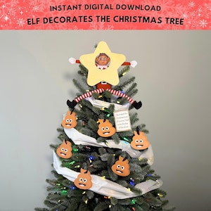 May include: A decorated Christmas tree with a star-shaped tree topper featuring an elf. The tree is adorned with poop emojis and toilet paper. The text "ELF DECORATES THE CHRISTMAS TREE" is at the top.