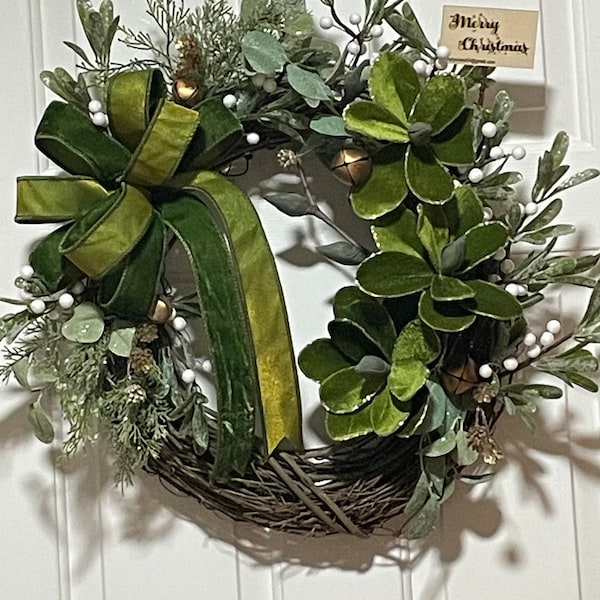 Emerald Velvet Magnolia Grapevine Christmas Wreath with Frosted Mistletoe. Iced Cedar and Eucalyptus with gold bells, mini gold pine cones.