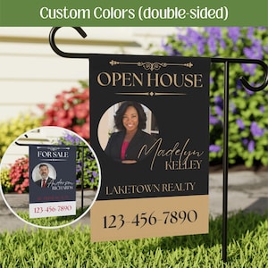 May include: A double-sided garden flag with the text "OPEN HOUSE" and "FOR SALE". The flag features a photo of a woman and a man, along with contact information. The flag is black, gold, and white, and is displayed on a black metal stand.