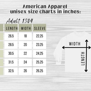 May include: Size chart for adult unisex long-sleeve shirts in inches. The chart shows measurements for length, width, and sleeve length for sizes S, M, L, XL, and 2XL.