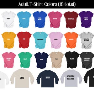 May include: A chart showing 18 different t-shirt colors, including white, aqua, true royal, berry, cardinal, team purple, gold, red, turquoise, lilac, orange, athletic heather, charity pink, kelly, navy, tan, black, and dark grey heather. The chart also shows the same colors in long-sleeve t-shirts.