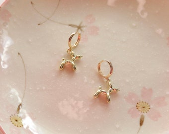Pendientes de perrito de oro inflados
