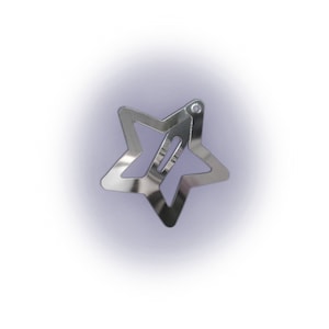 May include: A silver star-shaped hair clip with a smooth, shiny finish.