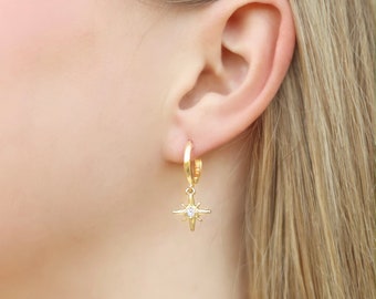 Pendientes centelleantes de oro