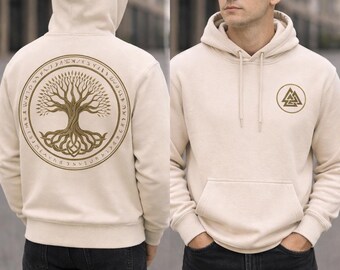May include: Sand-colored hoodie with a front pocket and a hood. The back features a circular design with a tree illustration and text. The front has a smaller emblem. The words "EARTH EDITION" and "SAND" are also visible.