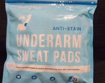 May include: A blue plastic bag with a white label that says "SIRONA ANTI-STAIN UNDERARM SWEAT PADS" and "Lock in excess sweat to avoid dampening your skin and clothes". The label also has icons for "Stain-free", "Odour Control", "Easy Touch", and "Pack of 24".