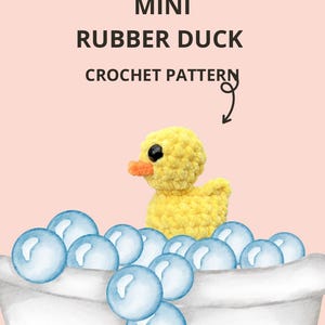 May include: A yellow crochet mini rubber duck sits in a white bathtub filled with blue bubbles. The image includes the text "MINI RUBBER DUCK CROCHET PATTERN" and "By CraftsmoreVT@etsy".
