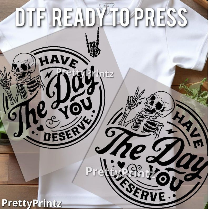 May include: Two black and white iron-on transfers featuring a skeleton with a peace sign and the text "Have the day you deserve."