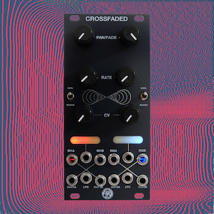 May include: A black modular synthesizer panel labeled CROSSFADED with six black control knobs, two toggle switches, and multiple input and output jacks. The interface features white text, graphic lines, and two horizontal light bars in orange and blue.