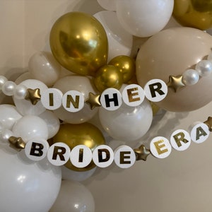 In her bride era Giant friendship bracelet garland bridal decor