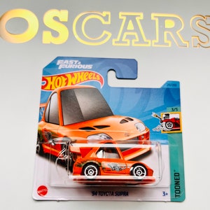Voiture moulée sous pression Toyota Supra '94 HotWheels. Carte courte.