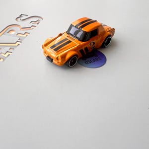 Hot Wheels Fairlady 2000-datsun-yellow With Black Wheels