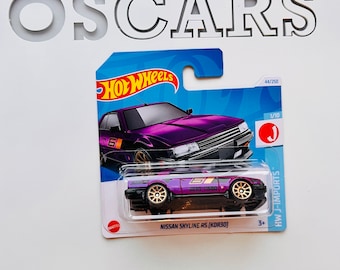 HotWheels Nissan Skyline RS (KDR30) purple die cast car.