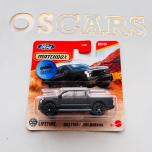 フォード F-150 ライトニング、マッチボックス ブラック、希少なダイキャスト コレクター向けおもちゃの車、ショート カードのモデル レプリカ! 男性や男の子、女の子へのプレゼントに最適!