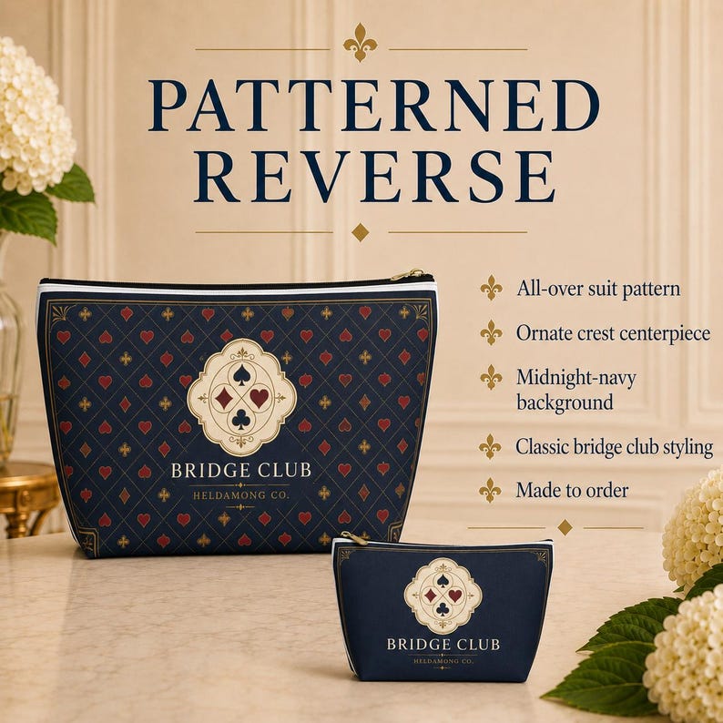 May include: Two navy blue zippered pouches featuring a repeating red and gold card suit pattern. The larger pouch displays a central ornate crest with the text BRIDGE CLUB HELDAMONG CO. The smaller pouch features a similar crest and text.