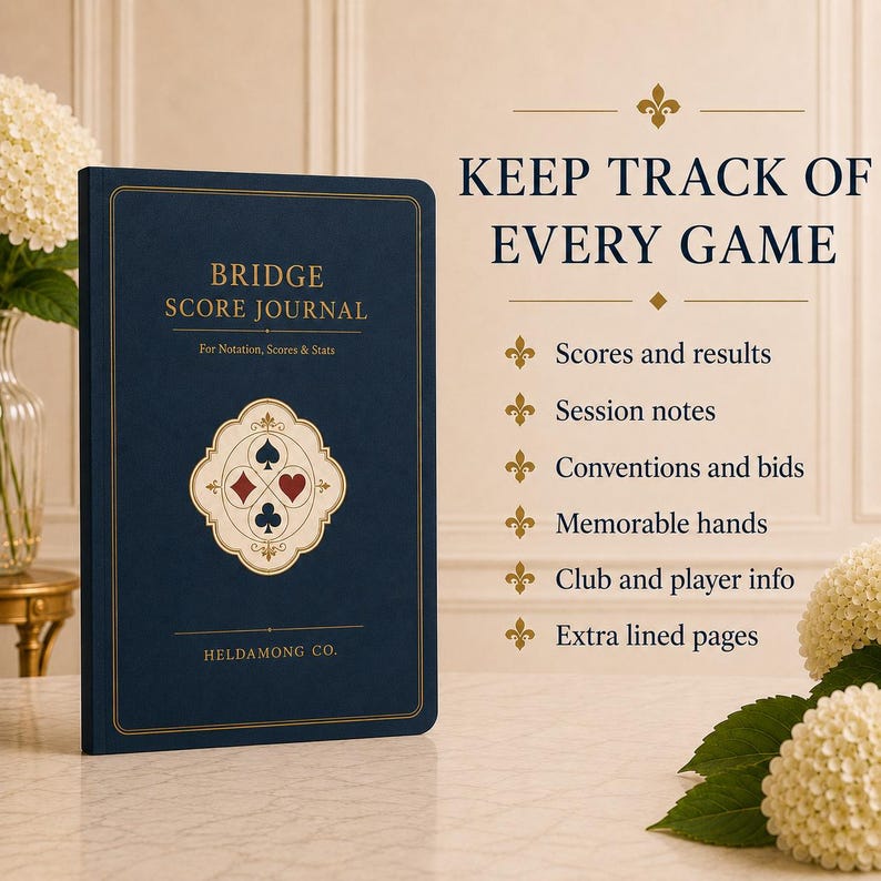 May include: A dark blue bridge score journal with gold lettering and a central emblem featuring four card suit symbols. The cover text reads BRIDGE SCORE JOURNAL For Notation, Scores & Stats HELDAMONG CO. The right side lists game tracking features.