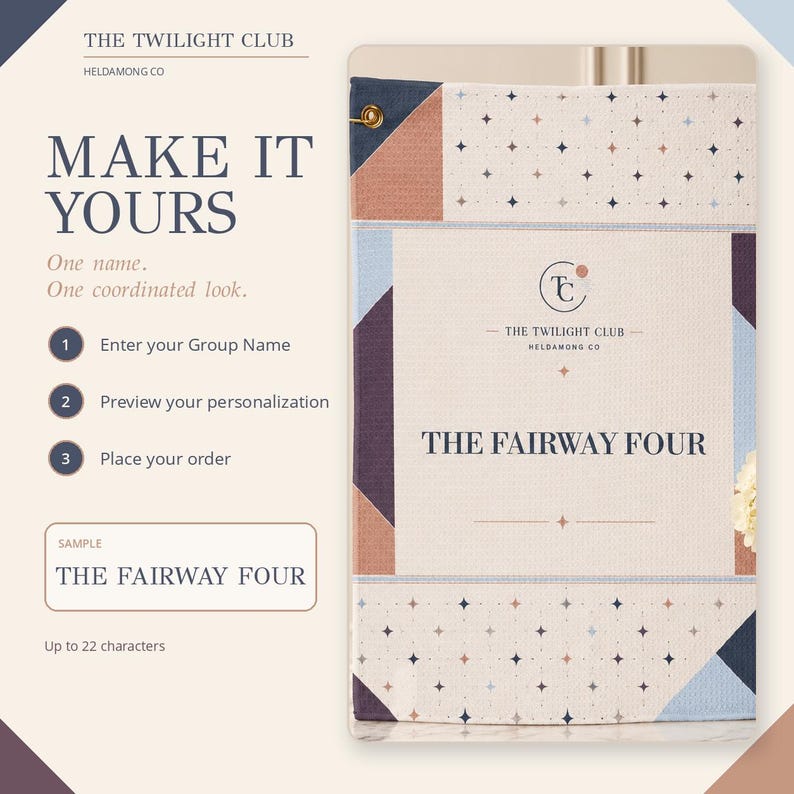 May include: A rectangular golf towel featuring a geometric pattern of stars in navy, light blue, and terracotta on a cream background. The center displays the text THE TWILIGHT CLUB and THE FAIRWAY FOUR with a brass grommet in the top corner.