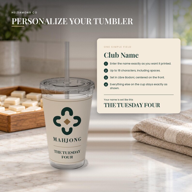 May include: A clear plastic tumbler with a straw, featuring a beige wrap with a dark green four-part symbol, the word MAHJONG, and the text THE TUESDAY FOUR. Next to it is a beige information card with instructions for personalizing the club name.