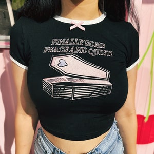 The Eternal Vacay Tee - Coquette Pink Bow Accent Black and White Ringer Baby Tee