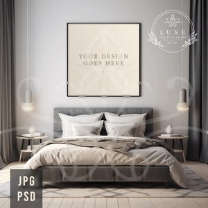 May include: A gray upholstered bed with white bedding and pillows in a modern bedroom setting. A black framed picture with the text "YOUR DESIGN GOES HERE" hangs on the wall above the bed.
