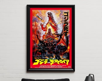 May include: A vintage movie poster for the Japanese film "Godzilla vs. King Ghidorah" featuring Godzilla and King Ghidorah in a fiery battle. The poster is framed in black and has Japanese text that reads "Godzilla vs. King Ghidorah" and "King Ghidorah Dies".