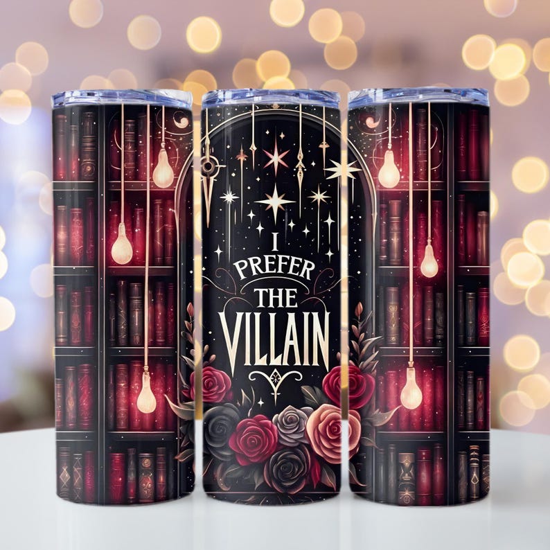 May include: A stainless steel tumbler with a black background and a bookshelf design. The tumbler features a floral design with red roses and the text "I prefer the villain".