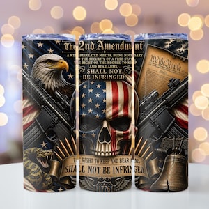 May include: Three stainless steel tumblers with patriotic designs. One features an eagle and rifle, another a skull with a flag design, and the third, the US Constitution and a rifle. The text reads "The 2nd Amendment" and "Shall Not Be Infringed."