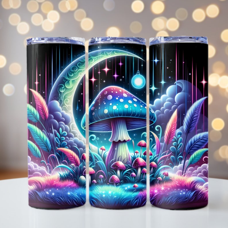 May include: A set of three stainless steel tumblers with a psychedelic design featuring a large mushroom, a crescent moon, and stars. The background is a dark blue with purple and pink accents.