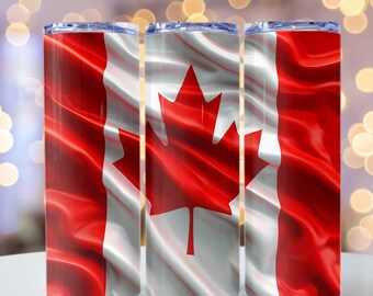 May include: Three stainless steel tumblers with a red and white Canadian flag design. The flag is a waving, silky fabric with a red maple leaf in the center.