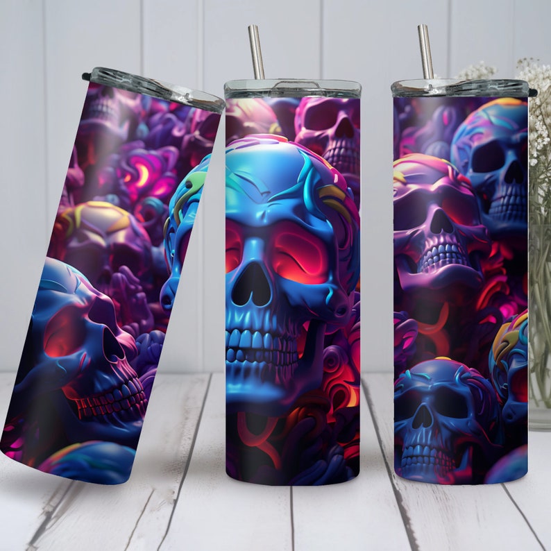 May include: A stainless steel tumbler featuring a colourful skull design. The skulls are blue, purple and pink with neon accents. The tumbler is ideal for holding hot or cold drinks.