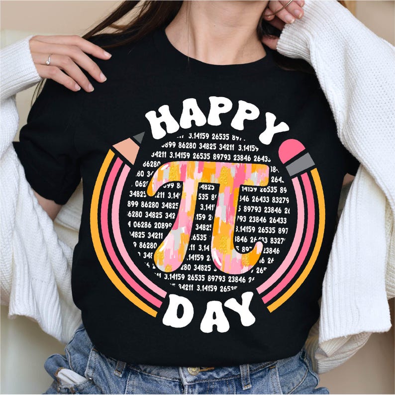 May include: A black t-shirt with a colorful graphic design featuring the mathematical constant pi, surrounded by rainbow-colored stripes and the text "Happy Pi Day".